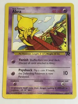 1st Edition Abra 49/82 Team Rocket Vintage Rare Pokemon Card - Image 1