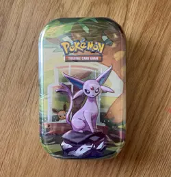 Pokemon TCG Scarlet & Violet—Prismatic Evolutions Mini Tin Espeon 10 Cards 6+ - Image 1