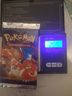 Pokemon Base Set Booster Pack Heavy 20.91/20.90g Sealed Charizard Art 1999 WOTC - Image 1