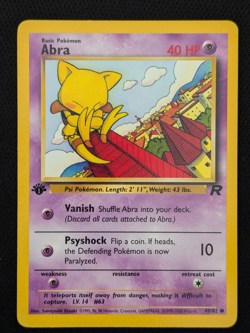 1st Edition Abra 49/82 Team Rocket Pokemon Card WOTC TCG 2000 - Image 1