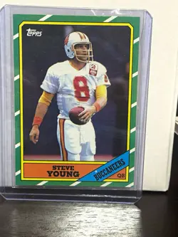 Topps 1986 Steve Young #374 RC D* on Copyright Line Buccaneers Base - Image 1