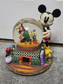 Disney 100 Years of Magic Musical with Motion Snow Globe - Image 1