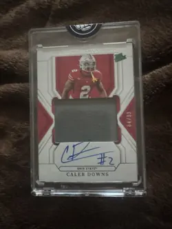 2025 National Treasures Caleb Downs On Card Auto Patch /99 Ohio State/Cowboys - Image 1