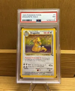 1999 Pokemon Fossil Dragonite Holo #4 PSA 7 Near Mint - Image 1