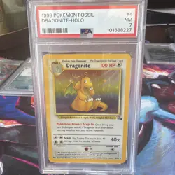 1999 Dragonite Fossil HOLO Rare PSA 7 4/62 Pokemon WOTC TCG - Image 1
