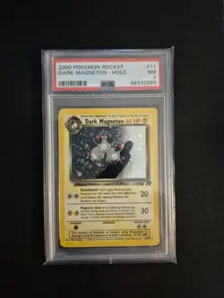 Dark Magneton 11/82 PSA 7 NM - Holo Rare Team Rocket Unlimited Pokemon TCG - Image 1