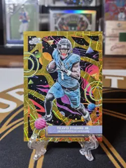 Travis Etienne 2025 Topps Cosmic Chrome #45 Gold Interstellar Refractor /50 SSP - Image 1