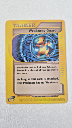 Weakness Guard 141/147 - Aquapolis (2003) - Charmander Art - Near Mint - Image 1