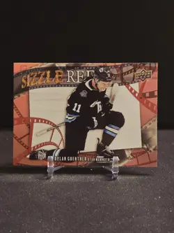2025-26 Upper Deck Series 2 Dylan Guenther Sizzle Reel Red /199 Mammoth #SR-55 - Image 1