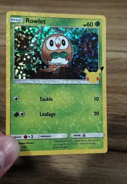 Holo Bleed - Rowlet - 7/25 McDonalds 25th Anniversary Set - Holo Pokemon Card - Image 1