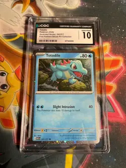 CGC 10 GEM MINT Miscellaneous Cards & Products #041/217 Totodile (Cosmos Holo) - Image 1