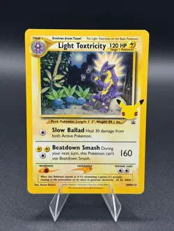 Light Toxtricity SWSH137 SWSH: Sword & Shield Promo Cards Holo - Image 1