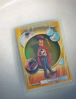 2026 Topps Chrome Disney Woody (Toy Story 5) #194 GOLD Wave Refractor /50 - Image 1