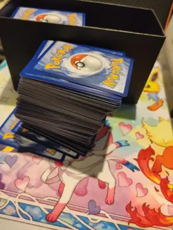 Pokemon Trading Card Game Mixed Lot - Charizard, Eevee, Binder, Sleeves, Playma… - Image 1