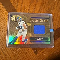 Panini 2024 Gold Standard - Gold Gear Puka Nacua Rams #GG-PNA /299 MEM - Image 1