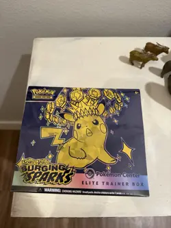 Pokemon TCG ETB Surging Sparks Pokemon Center Elite Trainer Box Factory Sealed - Image 1
