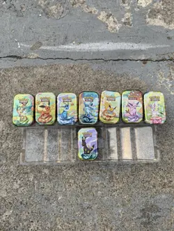 BRAND NEW Pokemon Prismatic Evolutions | Empty Mini Tins With Coins And Art Card - Image 2