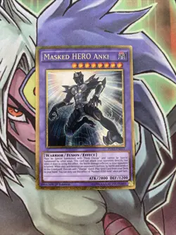 PGL2-EN011 Masked Hero Anki Gold Secret Rare 1st Edition NM Yugioh Card - Image 1