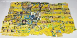 Huge Lot of Pikachu Pokemon Trading Cards, Coins, & Enamel Pins - Image 1