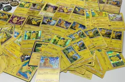 Huge Lot of Pikachu Pokemon Trading Cards, Coins, & Enamel Pins - Image 4