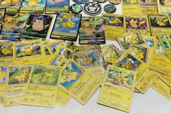 Huge Lot of Pikachu Pokemon Trading Cards, Coins, & Enamel Pins - Image 5