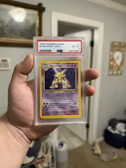 Pokemon TCG 1999 Base Set Alakazam Holo Rare 1/102 1st Ed PSA 4 - Image 1