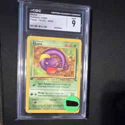 CGC 9 MINT Ekans 1999 Fossil 1st Edition 46/62 Pokemon Card - Image 1