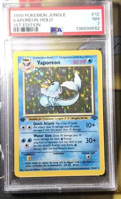 1999 POKEMON JUNGLE 1ST EDITION #12 VAPOREON-HOLO PSA 7 - Image 1