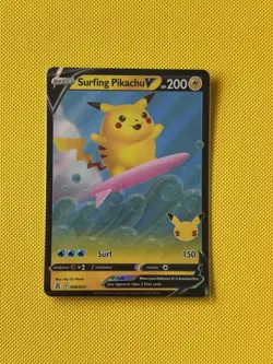 Pokemon TCG Surfing Pikachu v Celebrations Card 008/025 Near Mint Condition NM - Image 1