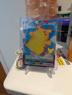 Pokemon TCG Surfing Pikachu VMAX Holo Card 009/025 Celebrations - Image 1