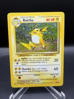 Pokemon TCG Raichu Fossil Holo Card 14/62 Unlimited Holo Rare MP Vintage WOTC - Image 1