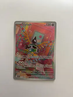 Sigilyph Holofoil Illustration Rare SV: White Flare 121/086 NM Pokemon Card - Image 1