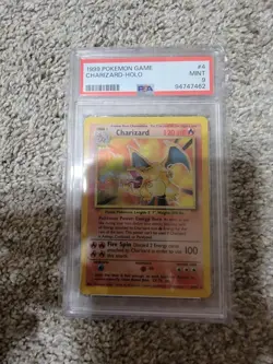 1999 Pokemon English Unlimited Charizard Holo Rare Base Set #4 PSA 9 Mint - Image 1
