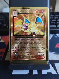 Pokemon TCG Charizard 4/102 Celebrations Gold Metal Card - Image 1