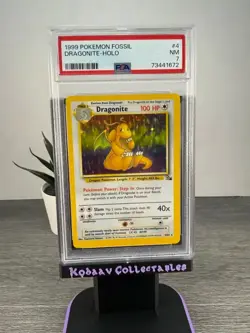 1999 Pokemon Fossil Dragonite - Holo PSA 7 4/62 NM - Image 1