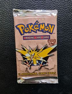 1999 Pokemon Fossil Booster Pack Zapdos Factory Sealed Trading Card Game - Image 1