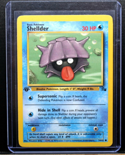 Pokemon TCG Shellder Fossil 54/62 1st Edition Regular 1999 WotC English MINT - Image 1