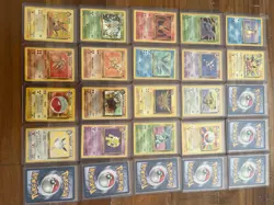 Vintage Pokemon Lot Includes 2 Holo, 16 Rare, and 7 mystery cards - Image 1