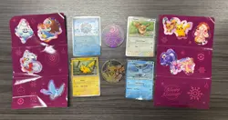 Lot of Pokemon TCG Holiday Calendar Items (Coins, Stickers, Promo Cards DAMAGED) - Image 1