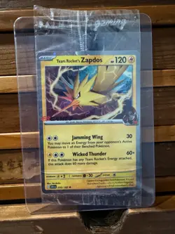 Team Rocket's Zapdos - 070/182 - EB Games Stamped Promo - Pokemon Card - SWIRL - Image 1
