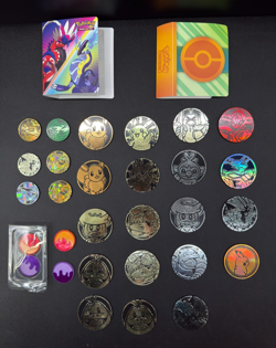 Lot of 29 Official Pokemon TCG Coins Jumbo & Small W/ Two Trading Card Game Book - Image 1