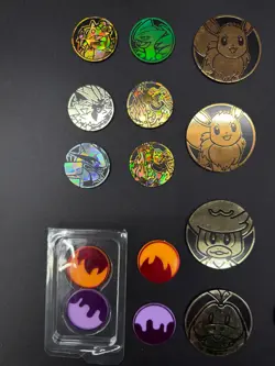 Lot of 29 Official Pokemon TCG Coins Jumbo & Small W/ Two Trading Card Game Book - Image 4