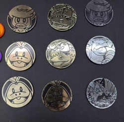 Lot of 29 Official Pokemon TCG Coins Jumbo & Small W/ Two Trading Card Game Book - Image 5