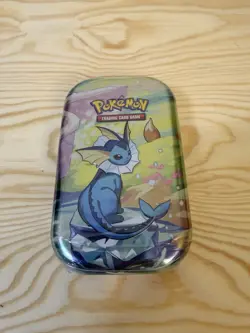 Pokemon TCG Scarlet & Violet Prismatic Evolutions Mini Tin - Vaporeon New Sealed - Image 1