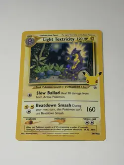 Light Toxtricity SWSH137 Celebrations Holo Black Star Promo SWIRL Pokemon TCG NM - Image 1