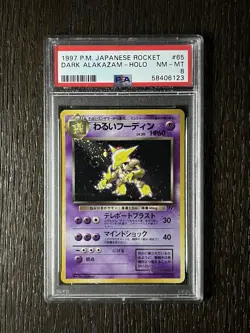 Dark Alakazam PSA 8 Pokemon WOTC 1997 Team Rocket Japanese #65 Holo Swirl - Image 1