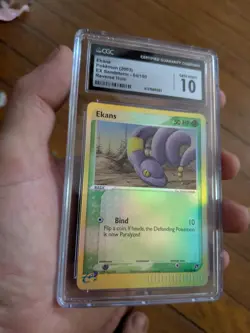 (POP 7) CGC 10 GEM MINT Pokemon Ekans 64/100 Reverse Holo ex Sandstorm Card - Image 1