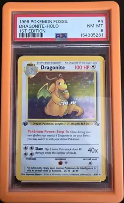 1999 POKEMON FOSSIL 1ST EDITION #4 DRAGONITE-HOLO PSA 8 - Image 1