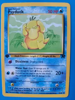 2000 Pokemon Team Rocket 1st Edition Psyduck 65/82 Common WOTC LP Vintage - Image 1