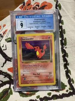 2000 Pokemon TCG Team Rocket Charmander 50/82 Unlimited CGC 9 Mint w/ Subgrades - Image 1